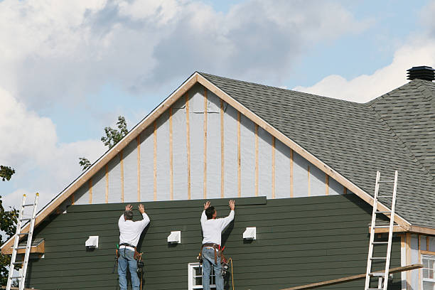 Professional Vinyl Siding technician working in Marengo, IL